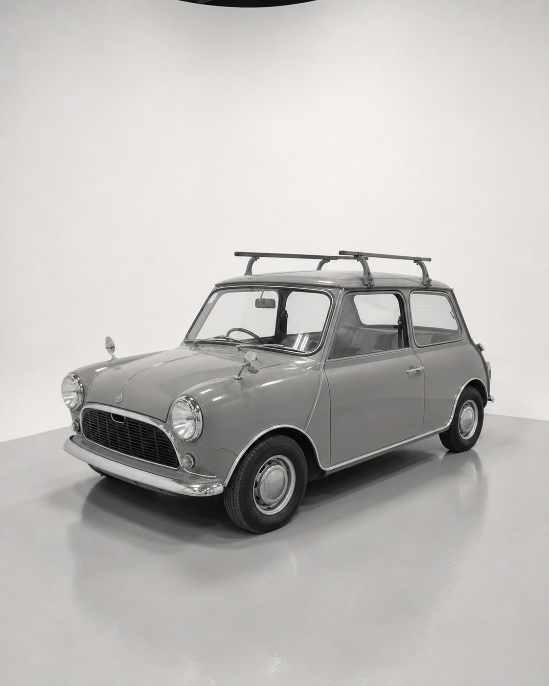 1974 Mini 1000 in a monochrome studio portrait